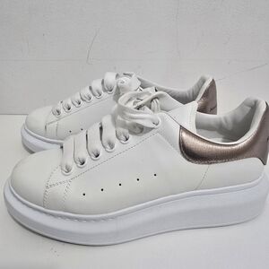 ALEXANDER MCQUEEN Metallic-trimmed leather exaggerated-sole sneakers, (Size 38)